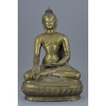 A Tibetan bronze seated medicine buddha. 40cm tall
