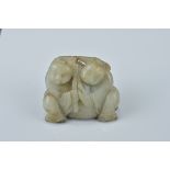 A Chinese celadon jade carving of two boys. 4Cm tall x 5cm width