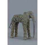 An Eastern bronze sculpture of an elephant. 30Cm tall