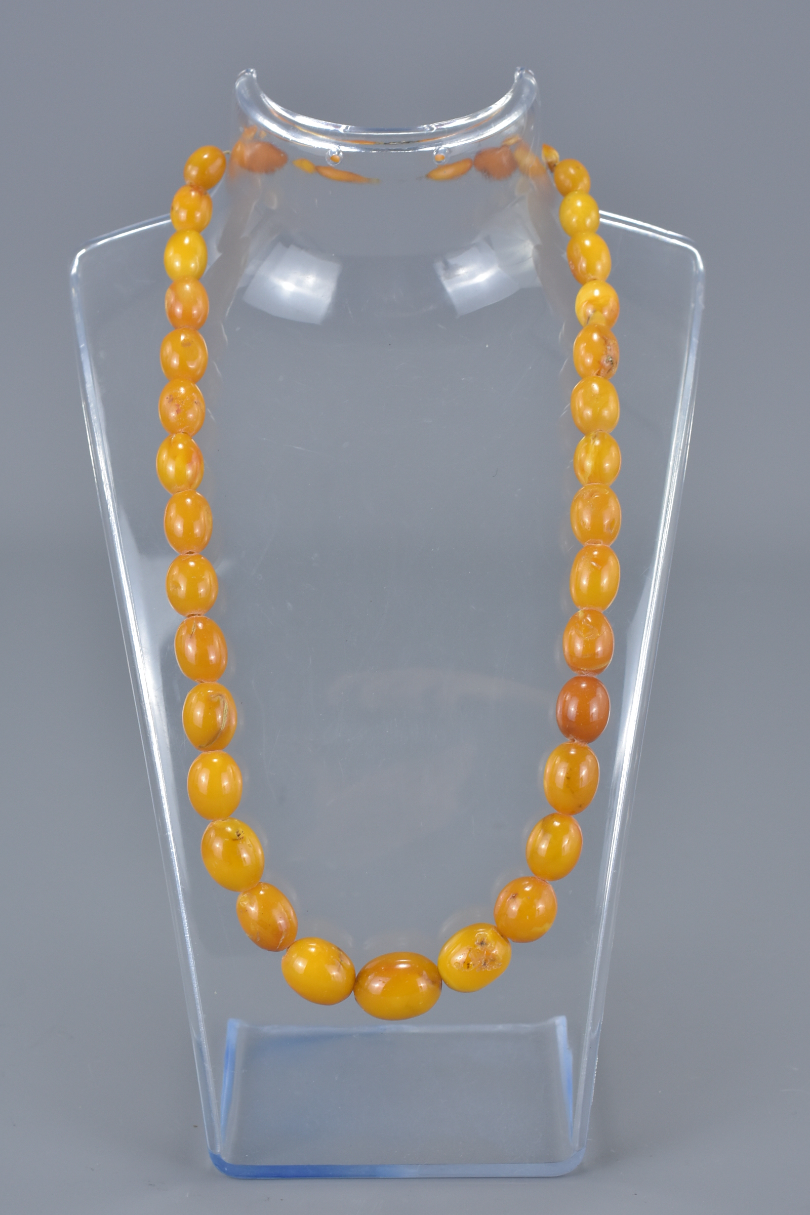 Butterscotch Amber Necklace containing 32 Graduating Ovoid Beads, approx. 41 grams