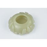 A Chinese 19th century pale celadon jade water dropper carved with three bats. 5.5cm length