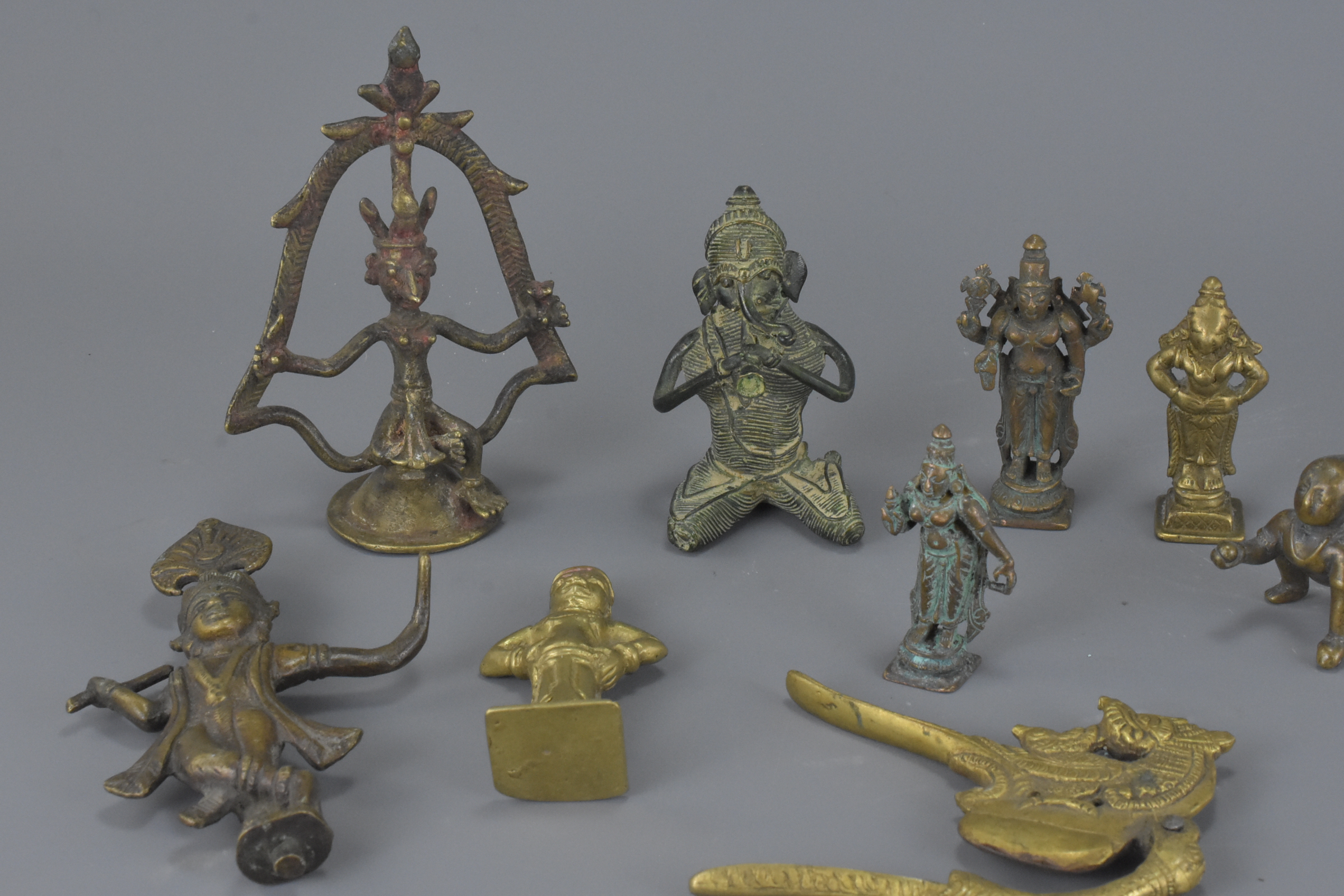 A group of nine various Eastern bronze metal items. 6Cm – 13cm - Image 3 of 3