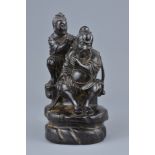 19th century Chinese Zitan Wood Carved Figure of a Seated Scholar and his Follower, 19cms high