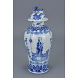 A Chinese 19th century blue and white porcelain vase and cover painted with ladies in garden. 16Cm t