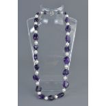 Pearl and Amethyst coloured Stone Necklace comprising 21 pearls of approximately 8mm and 22 stones o