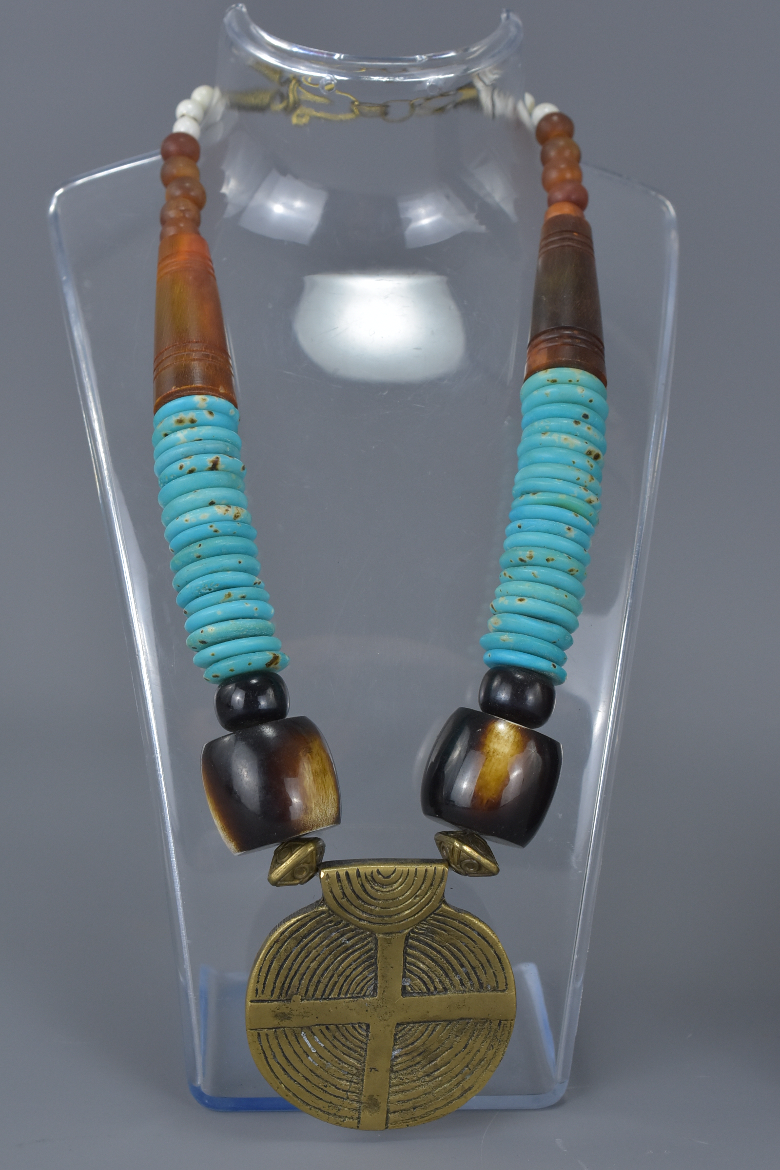 Two Ethnic Necklaces, one with wooden and turquoise coloured beads and large brass disc pendant, the - Image 3 of 3