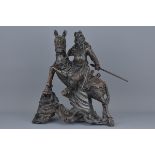 A Chinese carved hardwood figure of Guandi on horse with silver inlay work. 32Cm x 35cm