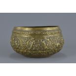 Burmese Metal Bowl with repousse decoration depicting figures and animals, 21.5cms