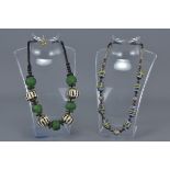 Two Ethnic Necklaces with stone, resin and white metal beads