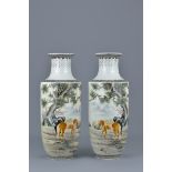 A pair of Chinese Republican period famille-rose porcelain vases. 27.5cm tall