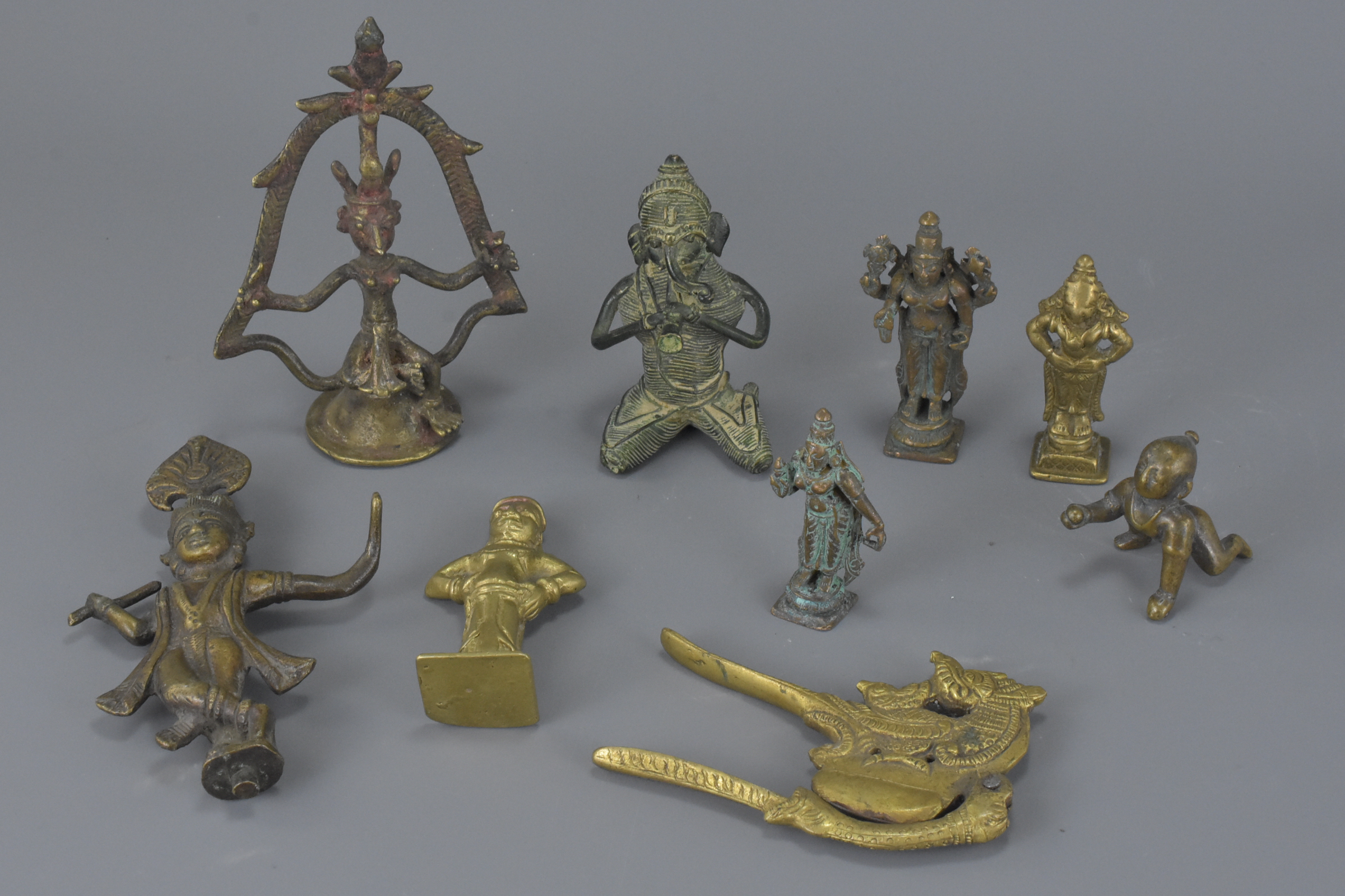 A group of nine various Eastern bronze metal items. 6Cm – 13cm