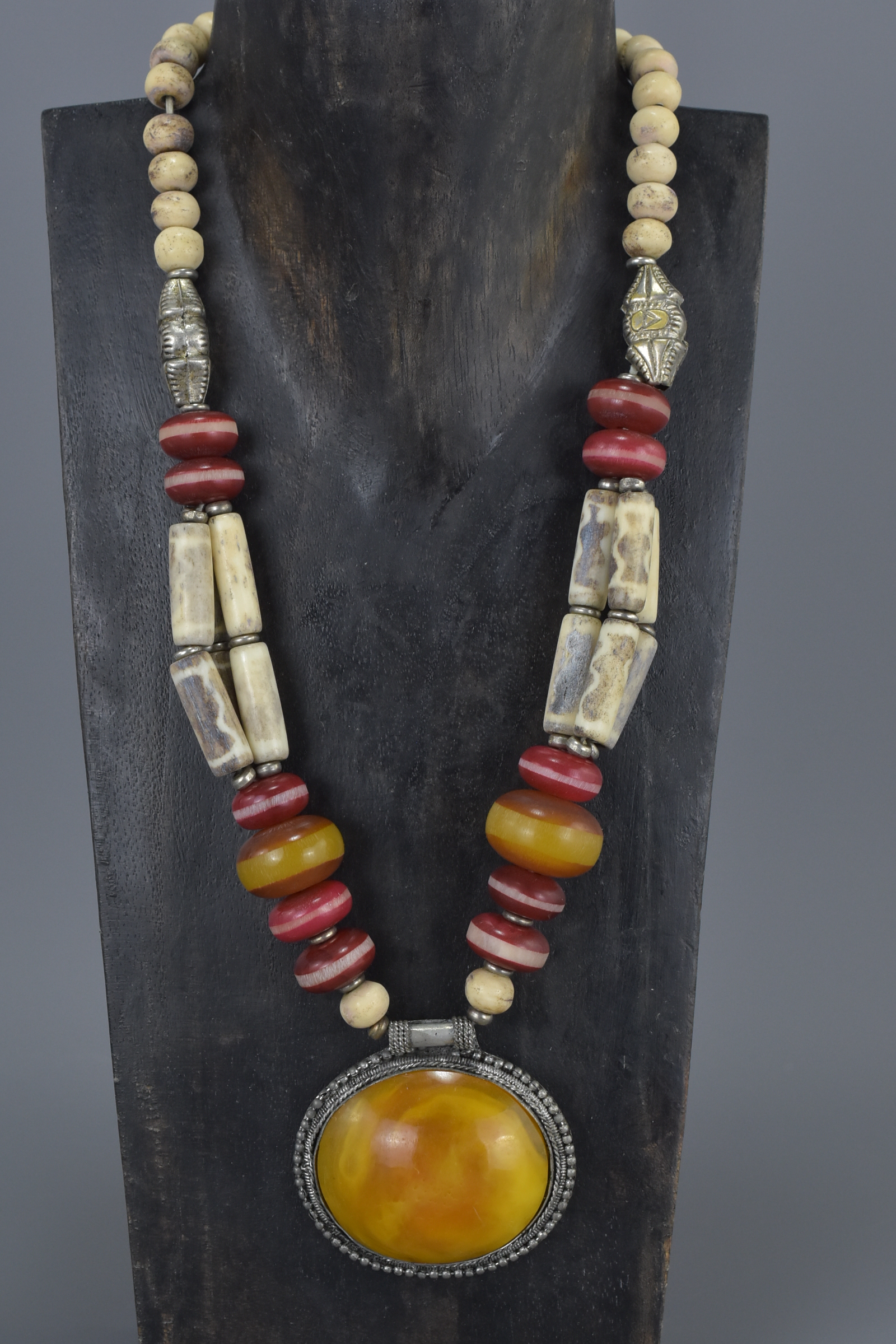 Two Ethnic Necklaces, one with wooden and turquoise coloured beads and large brass disc pendant, the - Image 2 of 3