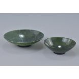 Two Chinese dark green spinach jade dishes. 9cm and 6.5cm diameters.
