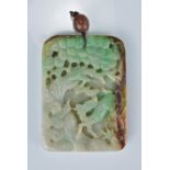 A Chinese pale celadon, green and russet jadeite pendant deeply carved with deer in forest and fish