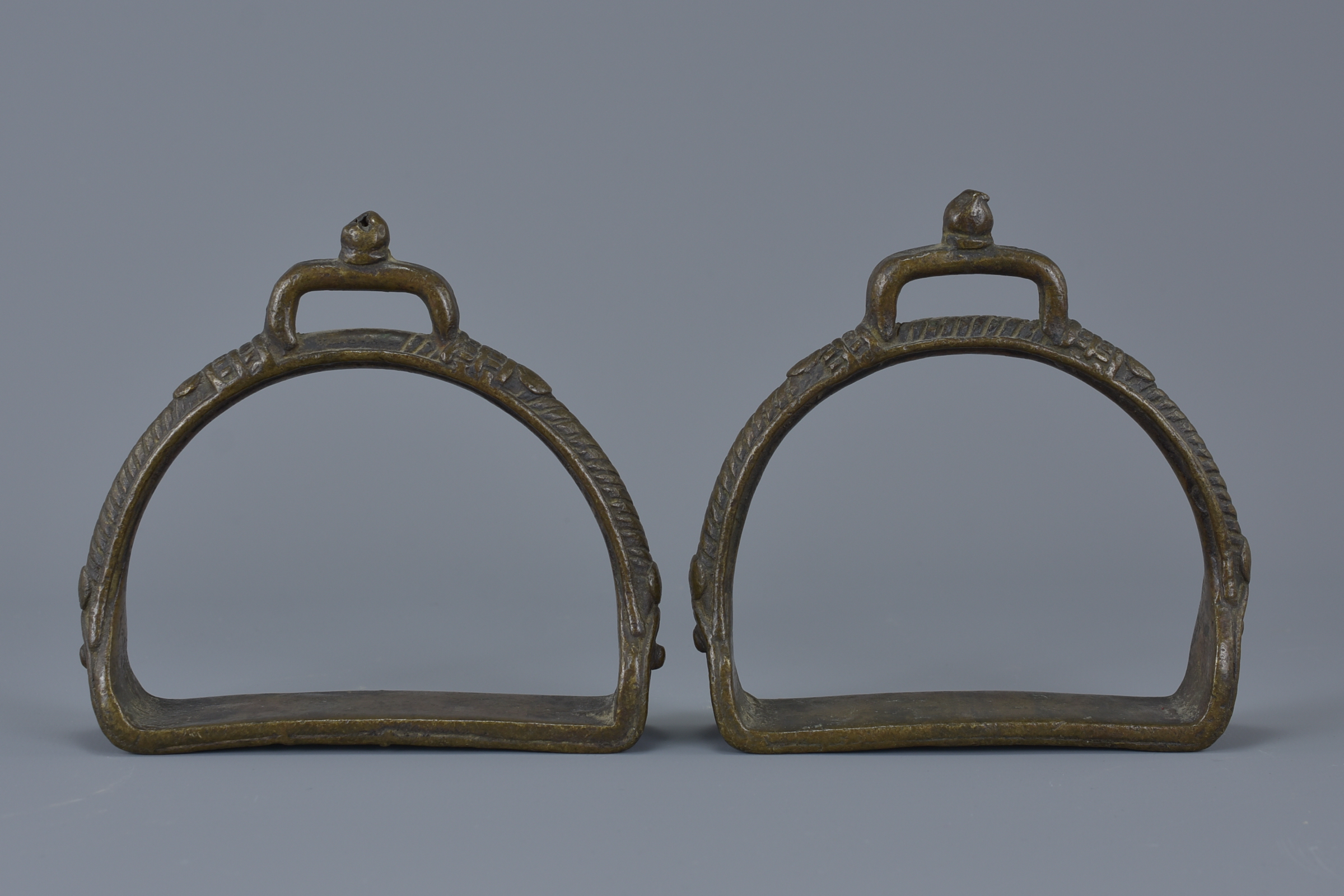 A pair of Indian bronze horse Stirrups. - Image 2 of 3