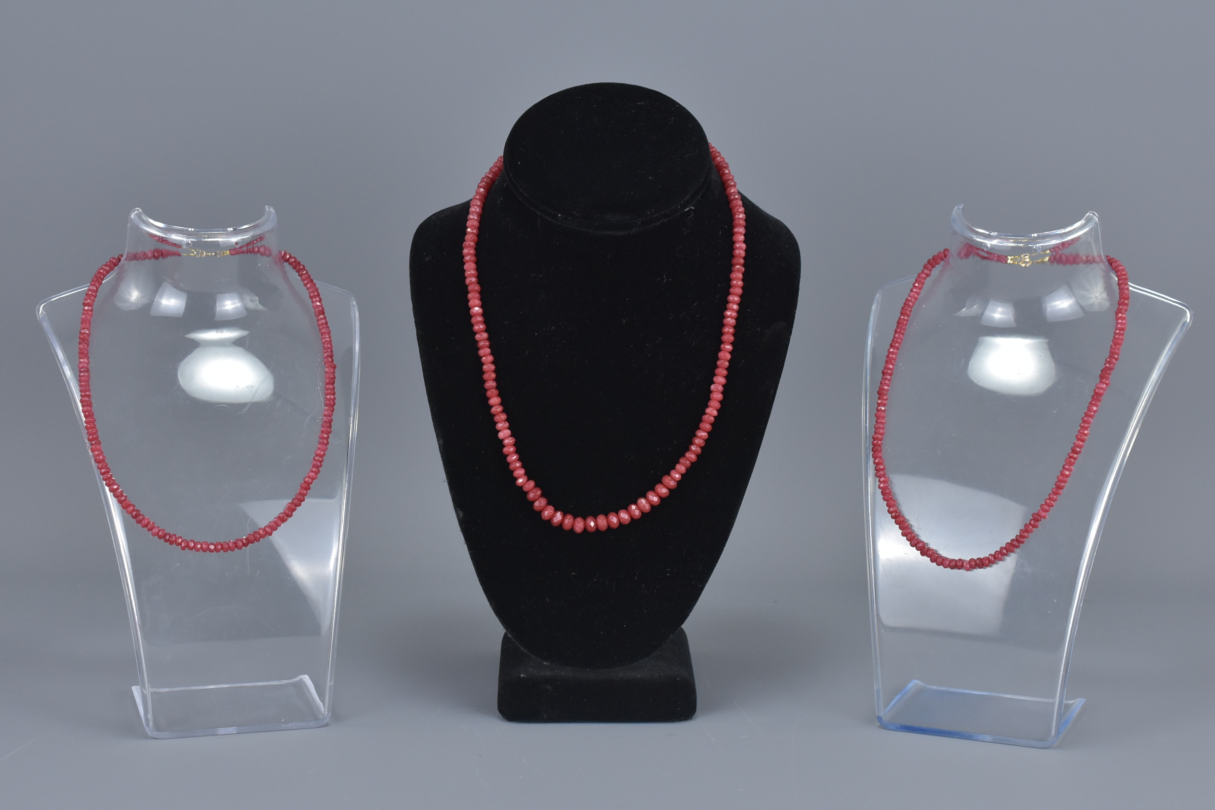 Three Necklaces of Small Pink Coloured Faceted Beads.