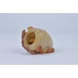 A Chinese 19/20th carved agate brush washer carved with bat, fruit and flowers. Size 6cm length x 4.