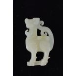 A Chinese white jade Qilin pendant