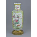 A Chinese 19th century porcelain vase on bronze stand