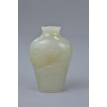 A Chinese 19th century jade snuff bottle