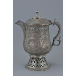 An Indian silver on copper ewer