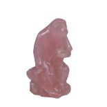 A Chinese rose quartz carved figure of a monkey