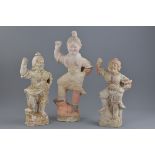 Three Chinese Tang dynasty pottery guardian figure