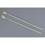 Pair of English Victorian ivory back scratchers