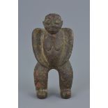 An unusual Native carved stone figure