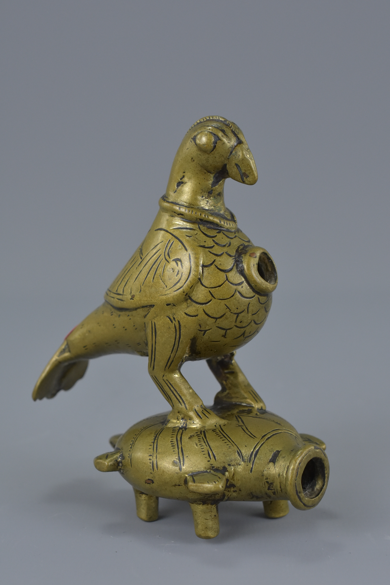 A Middle Eastern bronze fitting