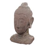 A large Thai sandstone head of Buddha