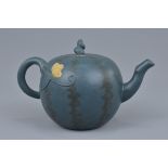 A Chinese Yixing pottery teapot