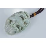 A Chinese jadeite pendant