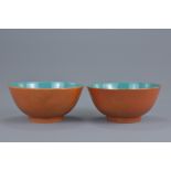 A pair of 19/20th century coral ground porcelain bowls