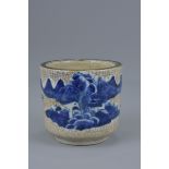 A Chinese 19th century porcelain joss stick pot