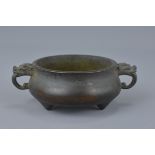 A Chinese Bronze twin handled Censer