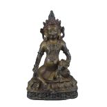 An 18th / 19th century Tibetan Bronze Jambhala figure