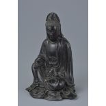 A Chinese 19th century Zitan wood Carving of a Seated Guanyin