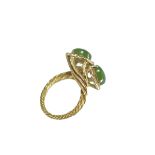 A vintage 18k gold twist ring with two jade cabochon