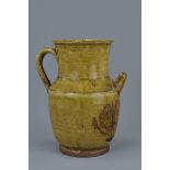 Chinese Tang / Changsha Glazed Stoneware Ewer coated in a finely-crackled yellowish-green glaze. Bel