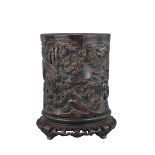 An 18th / 19th century Chinese hardwood Brush Pot superbly carved with scholar figures and inscripti