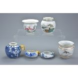 Six Chinese Late 19th century Porcelain Bird Feeders including Two Blue and White examples, Three Fa