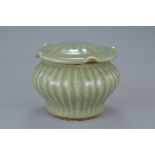 Chinese Longquan Celadon Porcelain Jar & Cover. The jar with a carved ribbed wall, the cover with ca