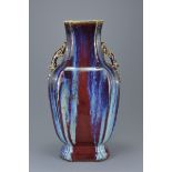 Chinese Porcelain 19th century Flambé Glazed Vase with Twin Lizard Handles bearing incised four char