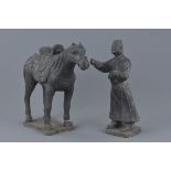 Chinese Yuan Black Pottery Horse and Groom well potted with good detail. The horse has a saddle and