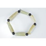 Chinese Six Bead Jade Bracelet in the form of Cheroots, each bead 3.5cms long
