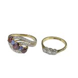 Two gold rings with coloured stones