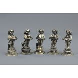 A group of five vintage silver plated name / menu holders in the form of boys serving food dishes.