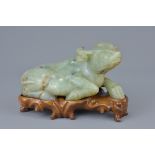 Chinese carved Celadon Jade Ox on a Carved Rosewood Stand, 16cms long