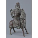 Chinese Bronze Figure of Guandi mounted on a Horse, 28cms high